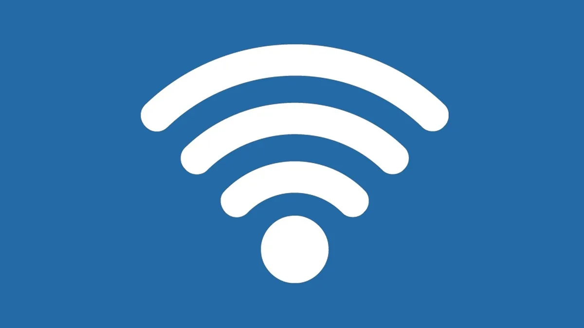 WLAN-Router und Drucker nebeneinander, symbolisierend die Netzwerkverbindung für Druckaufträge.